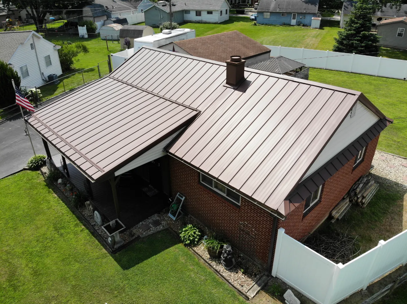 Tarping and dry-in on a Plum Creek commercial roof